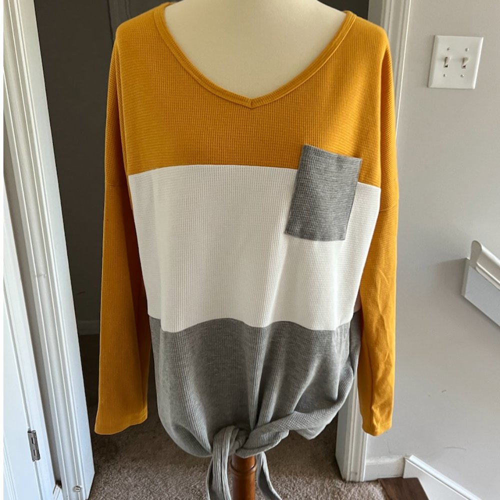 2x waffle top stripes with pocket (I felt it fits like 1x see size chart)